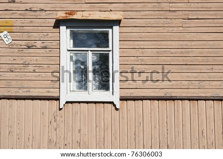 Old dirty white window in the old wooden house texture. The old age concept