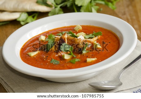 Mexican soup with chicken, avocado and coriander