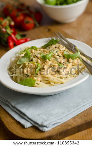 Linguine with crab meat, rocket and toasted pine nuts