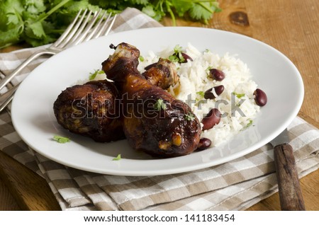 Jerk chicken with basmati rice and beans