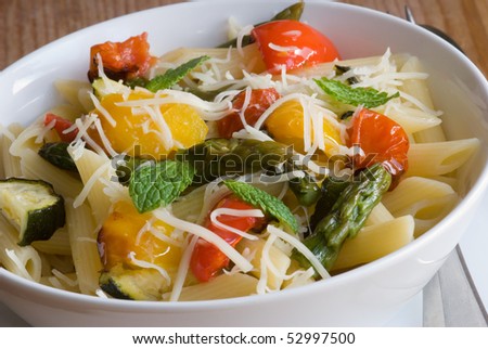 stock photo : Roasted vegetables with pasta penne