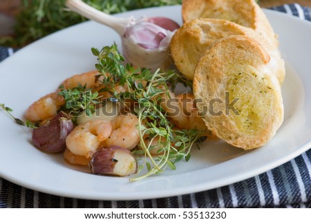 Prawns with garlic thyme and garlic bread