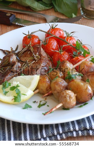 Rosemary lamb steak with potatoes on skewers