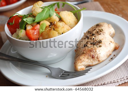 Chicken breast with warm cauliflower salad