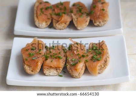 Swedish toasts topped with smoked salmon and herbs