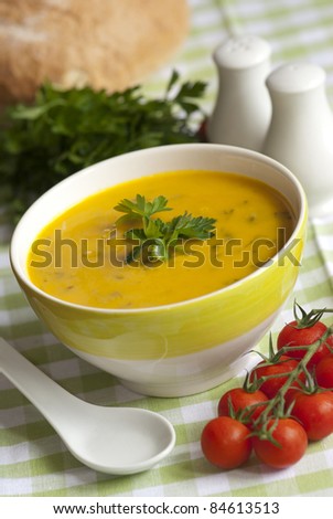 Sweet potato, smoked haddock and spinach soup in a bowl