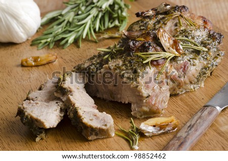 Butterflied pork shoulder with honey, garlic and rosemary