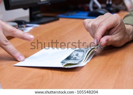 The transfer of an envelope with a bribe