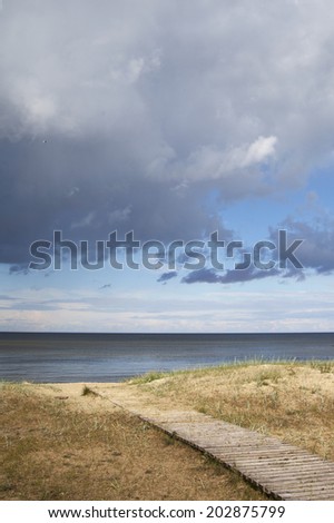 Wooden path at Baltic sea.