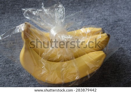 Bananas in plastic bag.