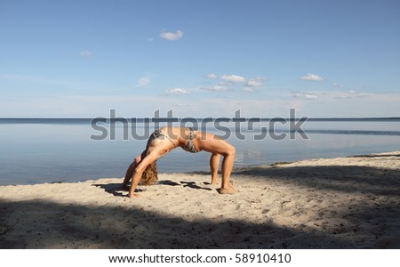 Back-bend on the beach.
