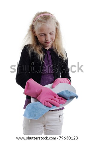 Girl cleaning plate.