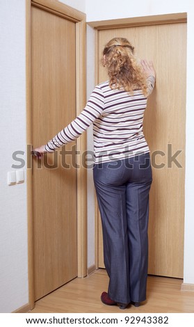 Woman closing doors.