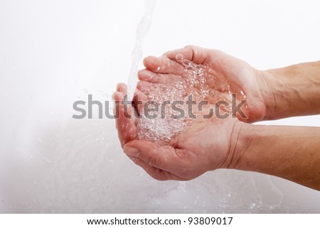 Hands and water.