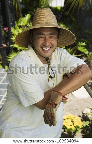 Portrait of a happy mature man wearing hat