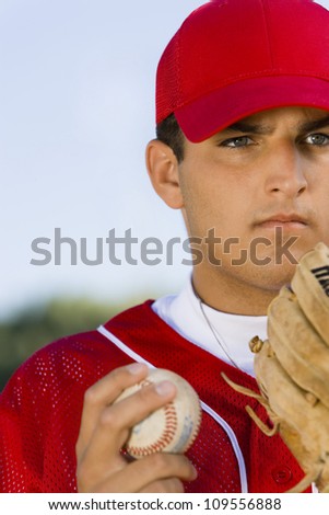 Portrait of baseball pitcher with glove