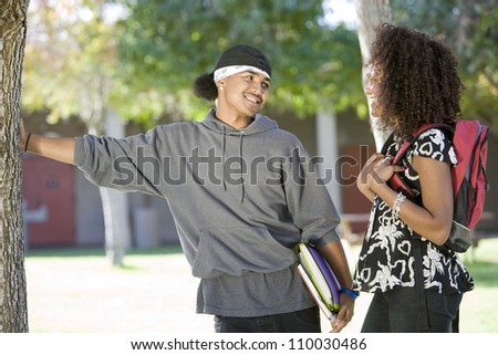 Two African American friends communicating at college campus