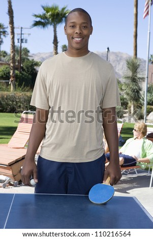 African American man playing table tennis