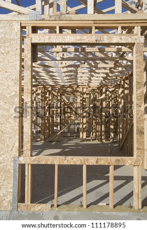 Window of a wooden house under construction