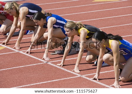 Female athletes at starting line