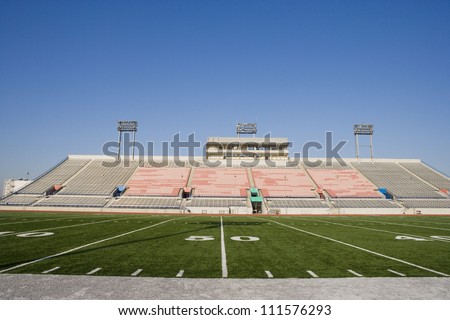 Yard lines on American football field in stadium