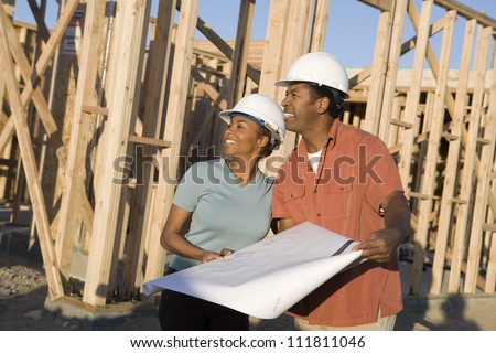 African American couple at construction site