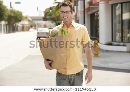 Man carrying a vegetable bag