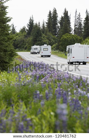 Recreational vehicles on a rural road