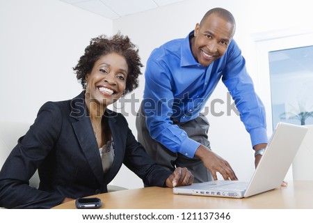 Portrait of an African American business people working together in office