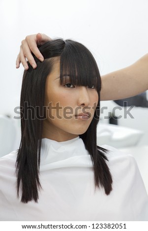 Asian woman at beauty salon