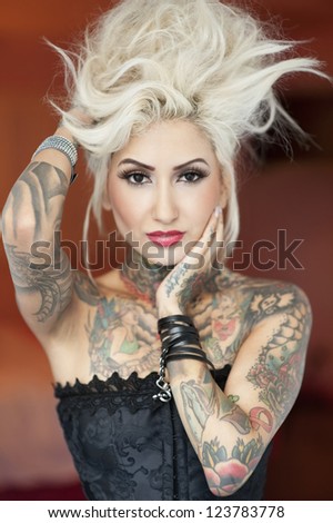Portrait of sexy young woman with hand in hair