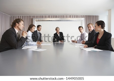 Multiethnic business people having discussion in meeting room