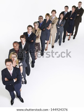 Full length group portrait of multiethnic businesspeople in a row against white background