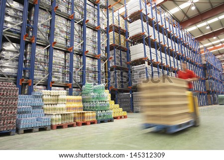 Blurred Forklift Driver Warehouse