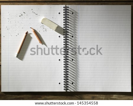 Blank Pad of Paper Eraser and Broken Pencil