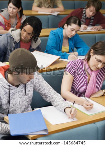Group of multiethnic students in lecture room