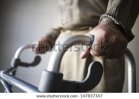 Closeup Midsection Of A Man Using Walking Frame