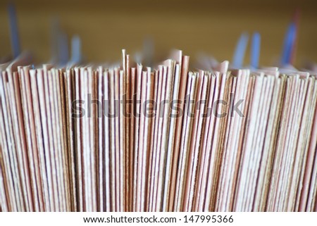 Closeup of colour coded filing system for folders
