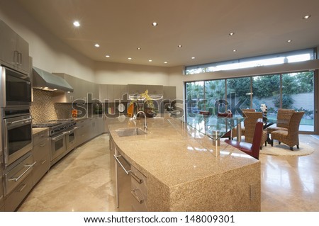 Open plan kitchen with dining area in modern house