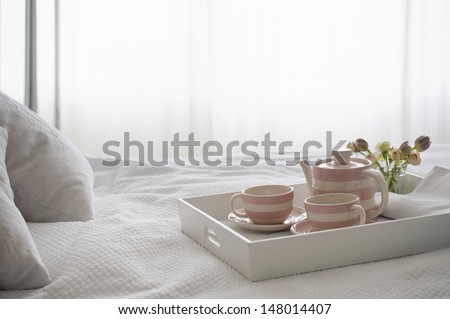 Pink Striped Teaset On Breakfast Tray In Bedroom