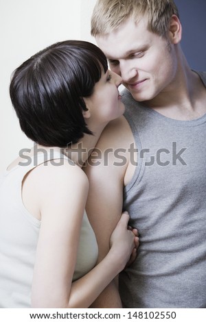Romantic young couple rubbing noses