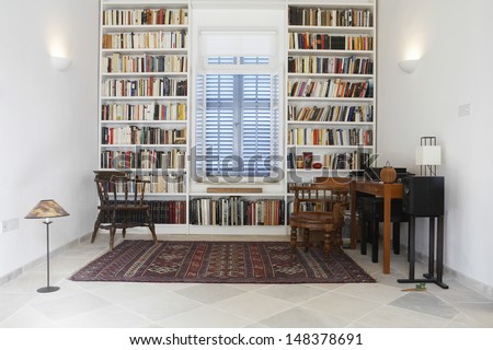 Interior Of Town House With Books Arranged In Library