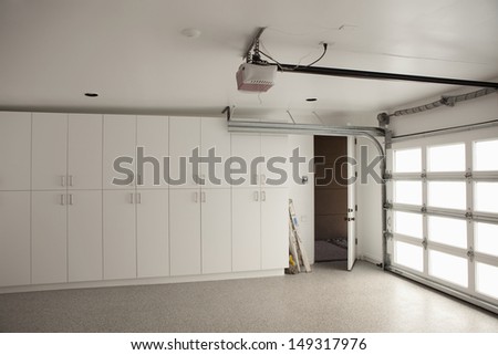 View of empty industrial unit with storage cabinets