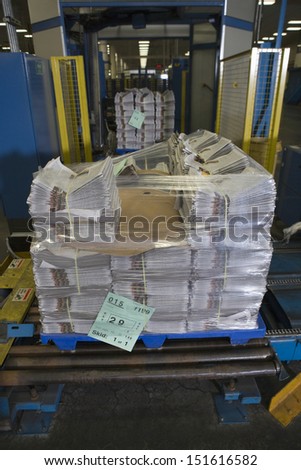 View of pile of newspapers in the factory