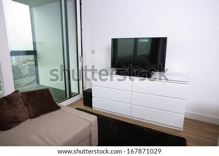 Interior of apartment with flat screen television