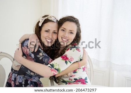 Young siblings hugging