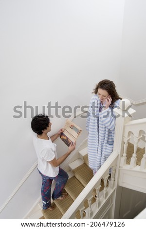 Man and woman busy in their daily routine
