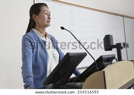 Female teacher in lecture theatre
