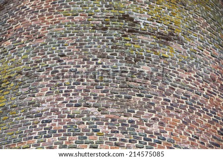 Close-up view of  red cobbled tower