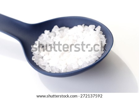 Close up of salt grains on spoon